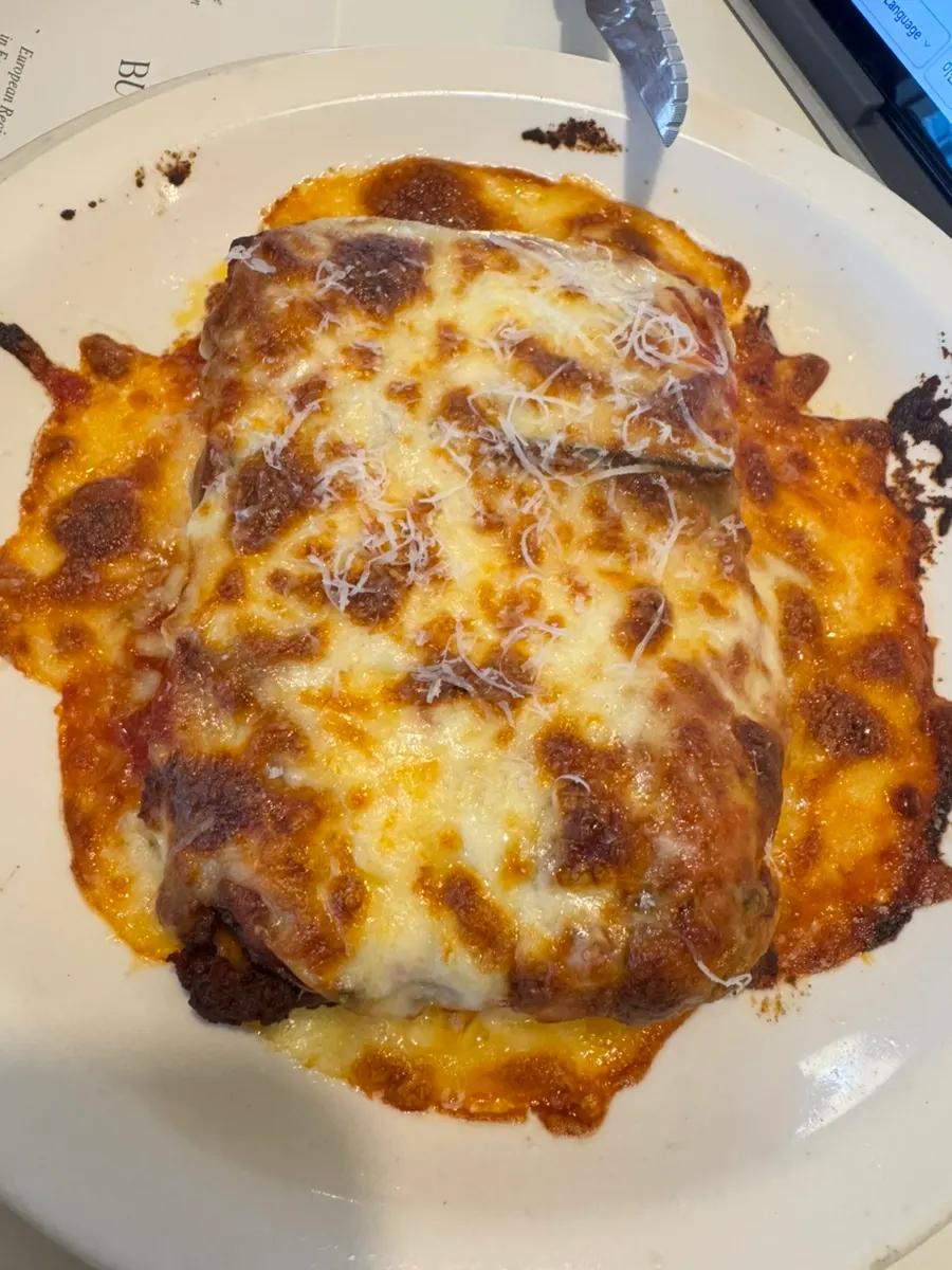 Top of the lasagna covered in cheese