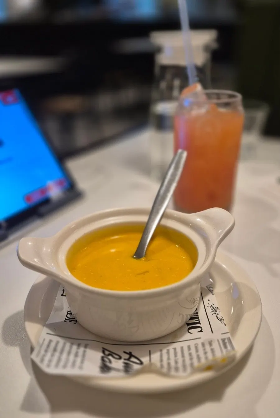 Pumpkin soup served as the first course of the set