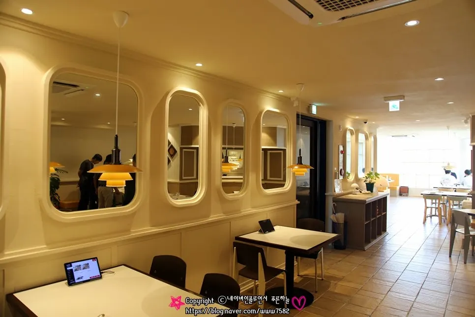 Interior of Bueokgan Haeundae Branch with spaced-out tables