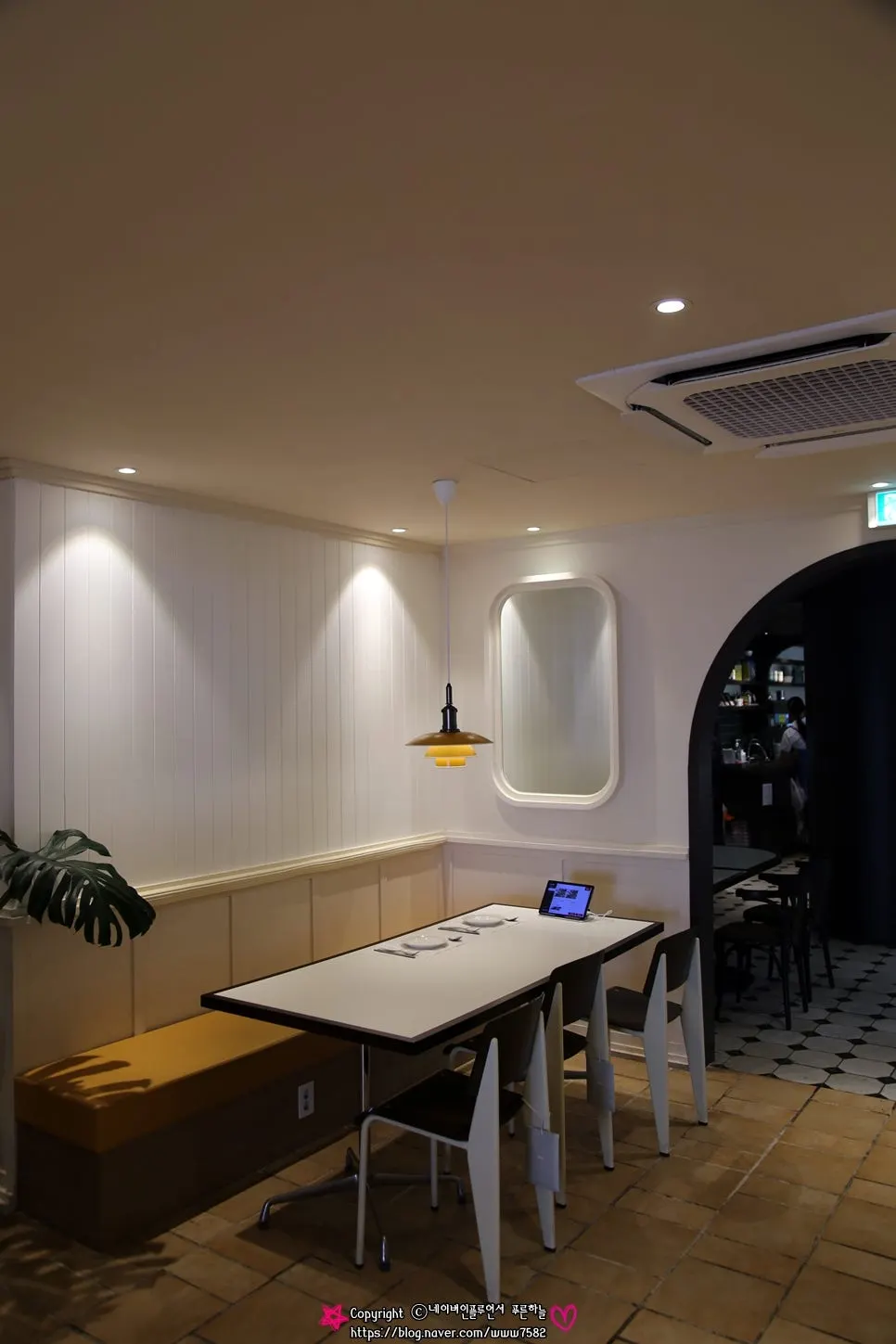 Vertical photo of Bueokgan Haeundae Branch's warm-toned interior