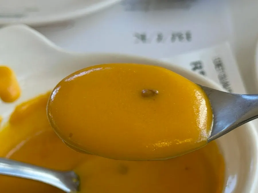 Spoonful of pumpkin soup