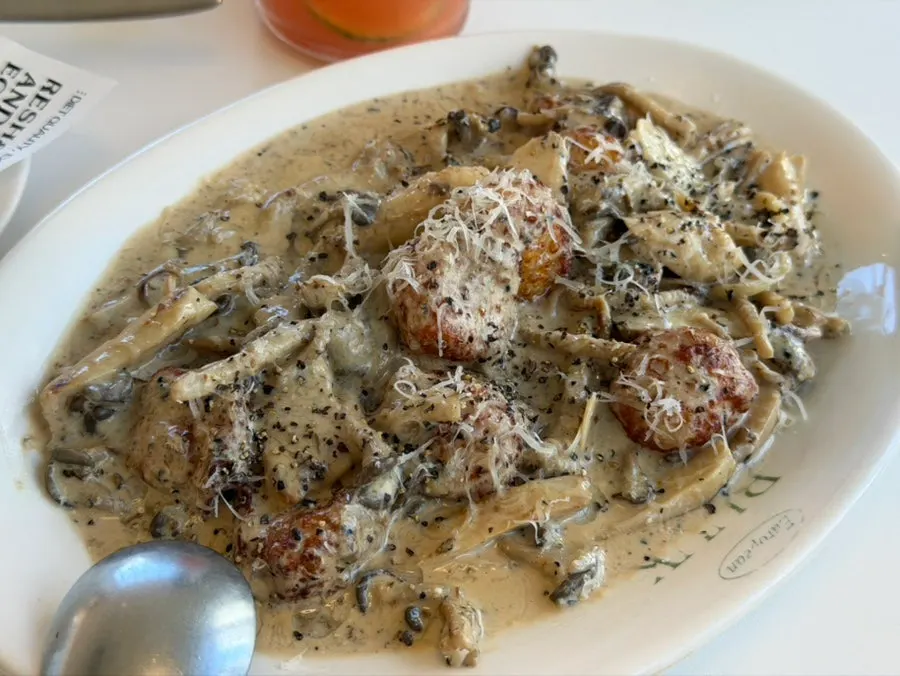 A plate of truffle mushroom cream gnocchi