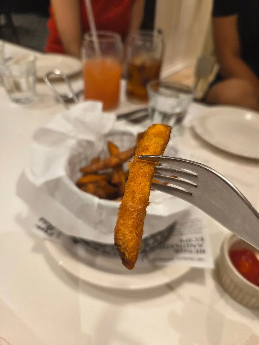 Close-up of crispy fried sweet potato fries