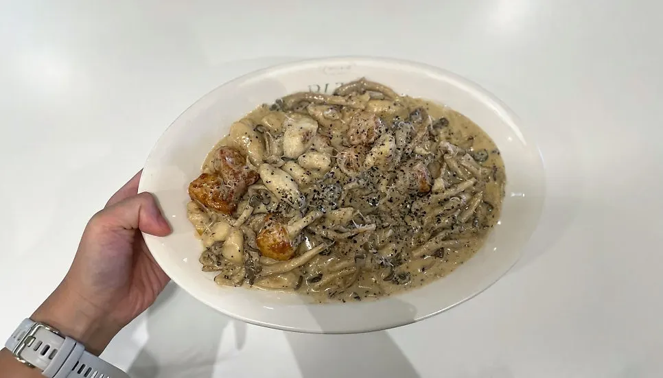 Truffle mushroom cream gnocchi piled high with mushrooms