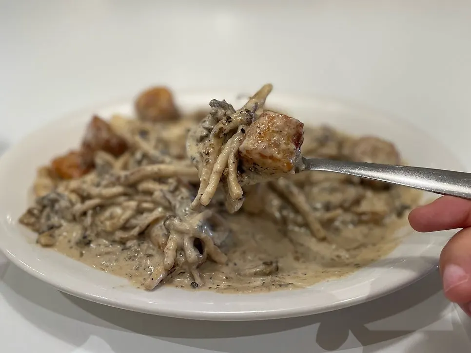 A scoop of chewy gnocchi and mushrooms