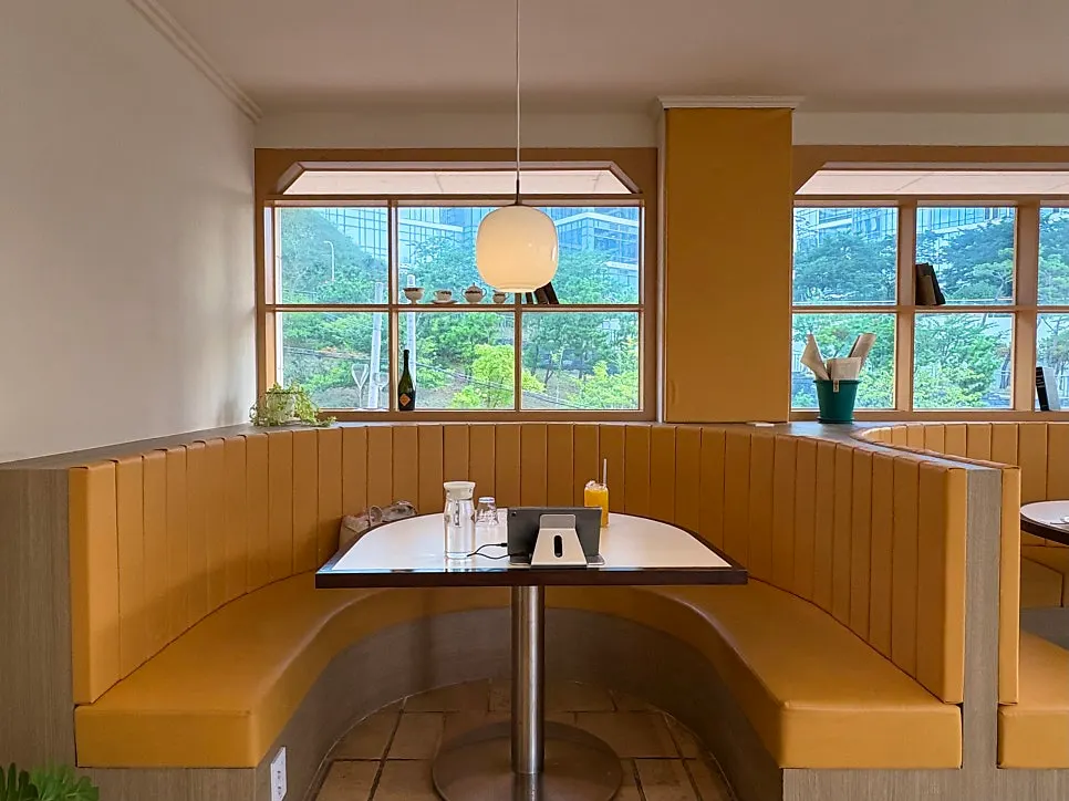 Spacious interior with signature tables and chairs