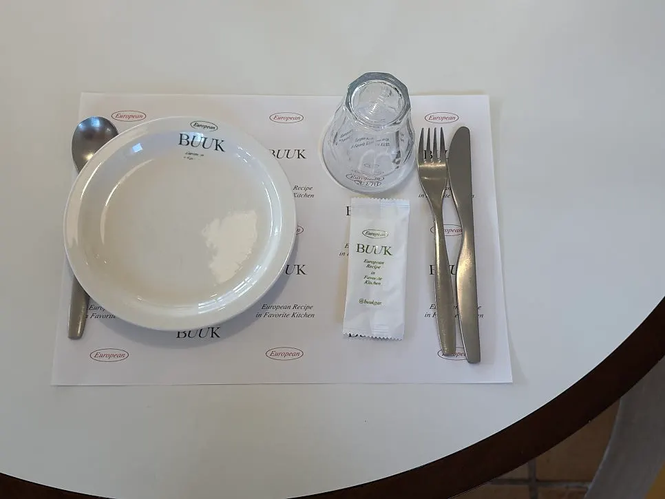 Table set with dishware after ordering