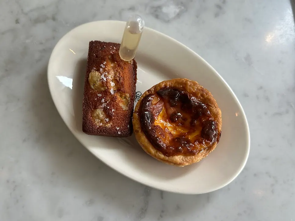 Egg tart and financier dessert selection