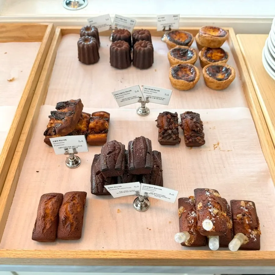 Signature tarts and financiers on display