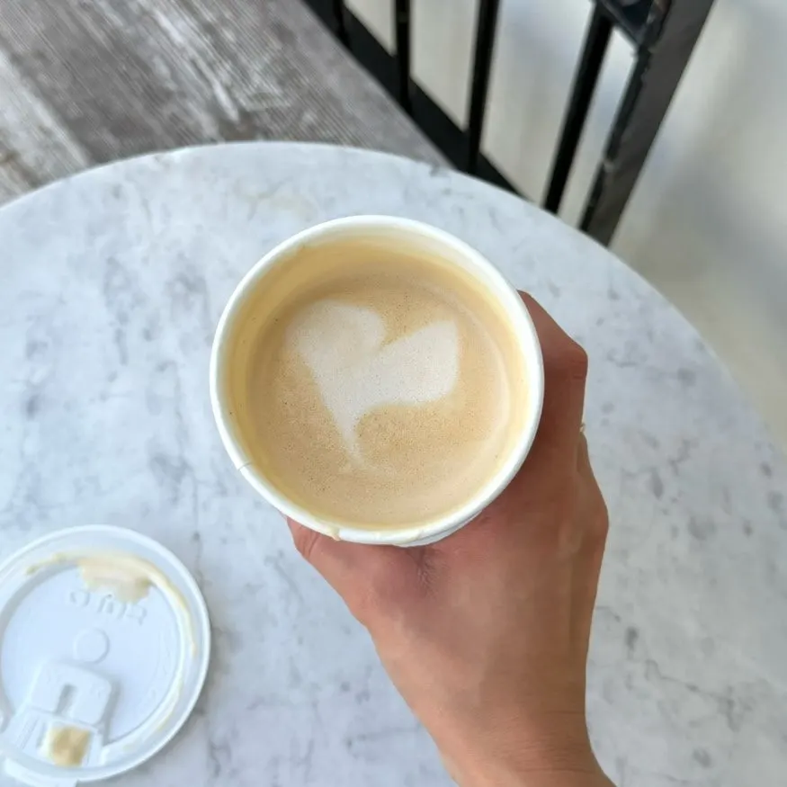 Latte topped with heart latte art