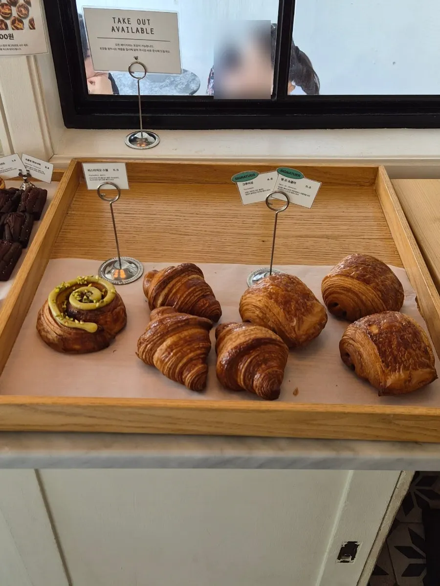 Bakery display case with pastries