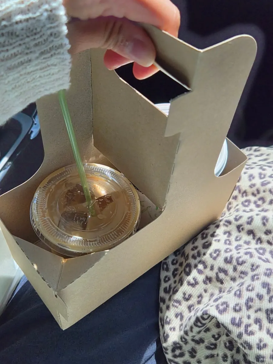 Neatly packed drinks and desserts for takeout