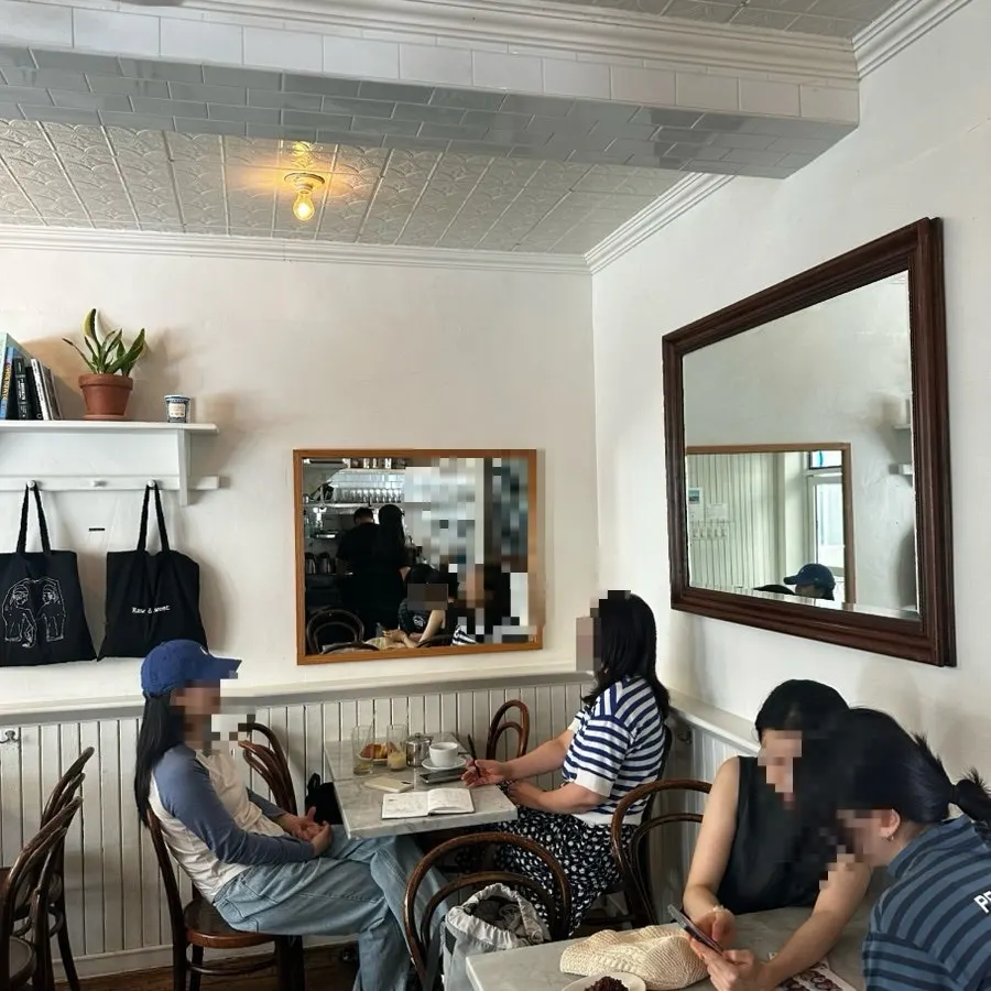 Tables and chairs inside Low & Sweet Bakery