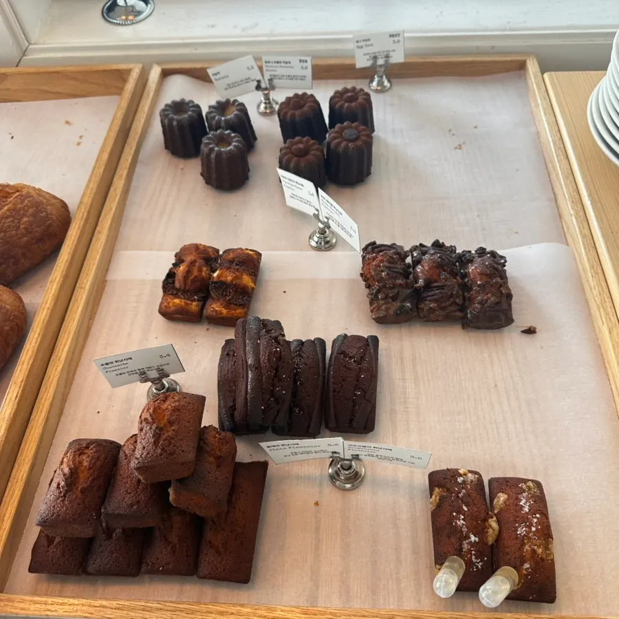 Salt bread and croissants on the display shelf