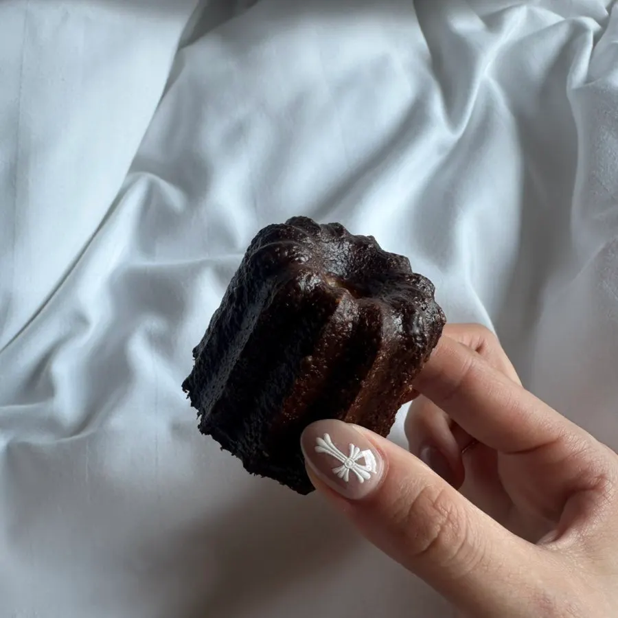 Canelé and financier packed to take home
