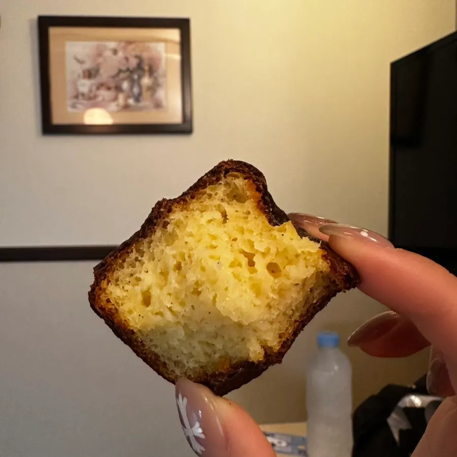 Cross-section of a canelé cut in half