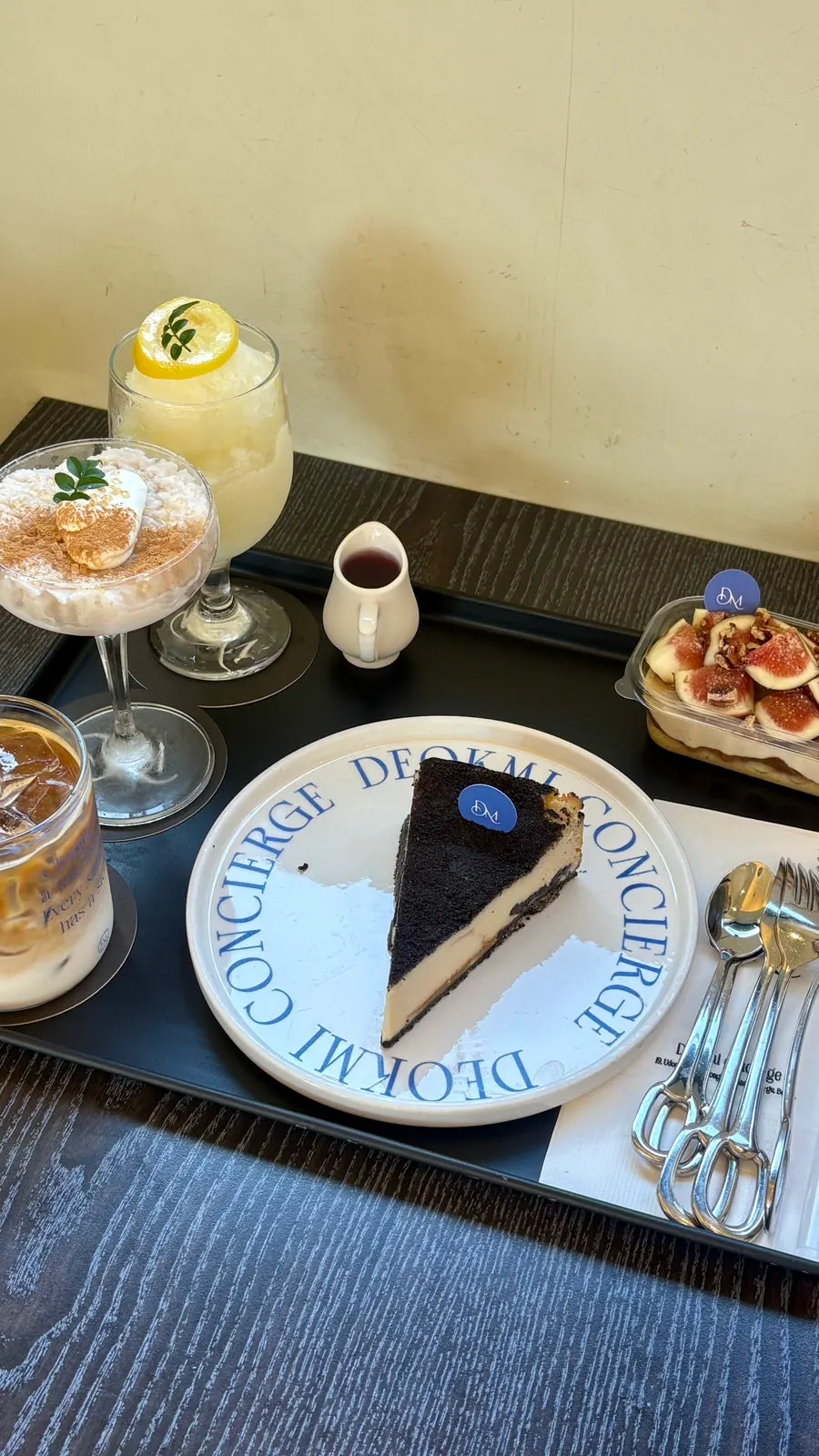 A tray of drinks and desserts served together