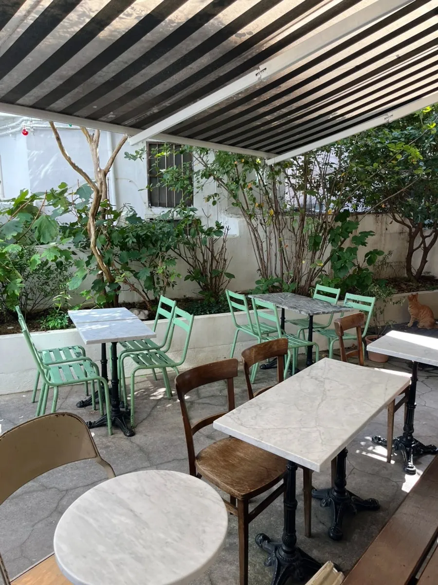 Seating area extending deep into the café