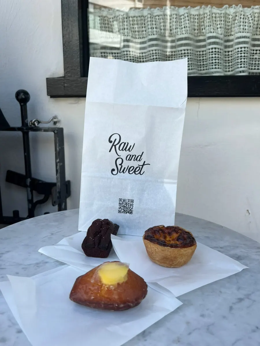 Three desserts packaged for takeout