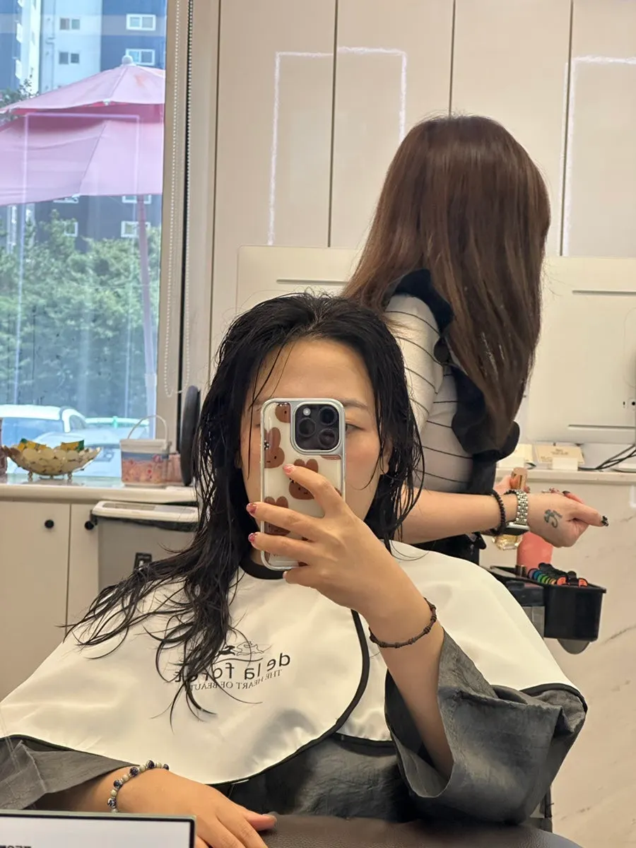 Wet hair with restored elasticity after the treatment scalp massage