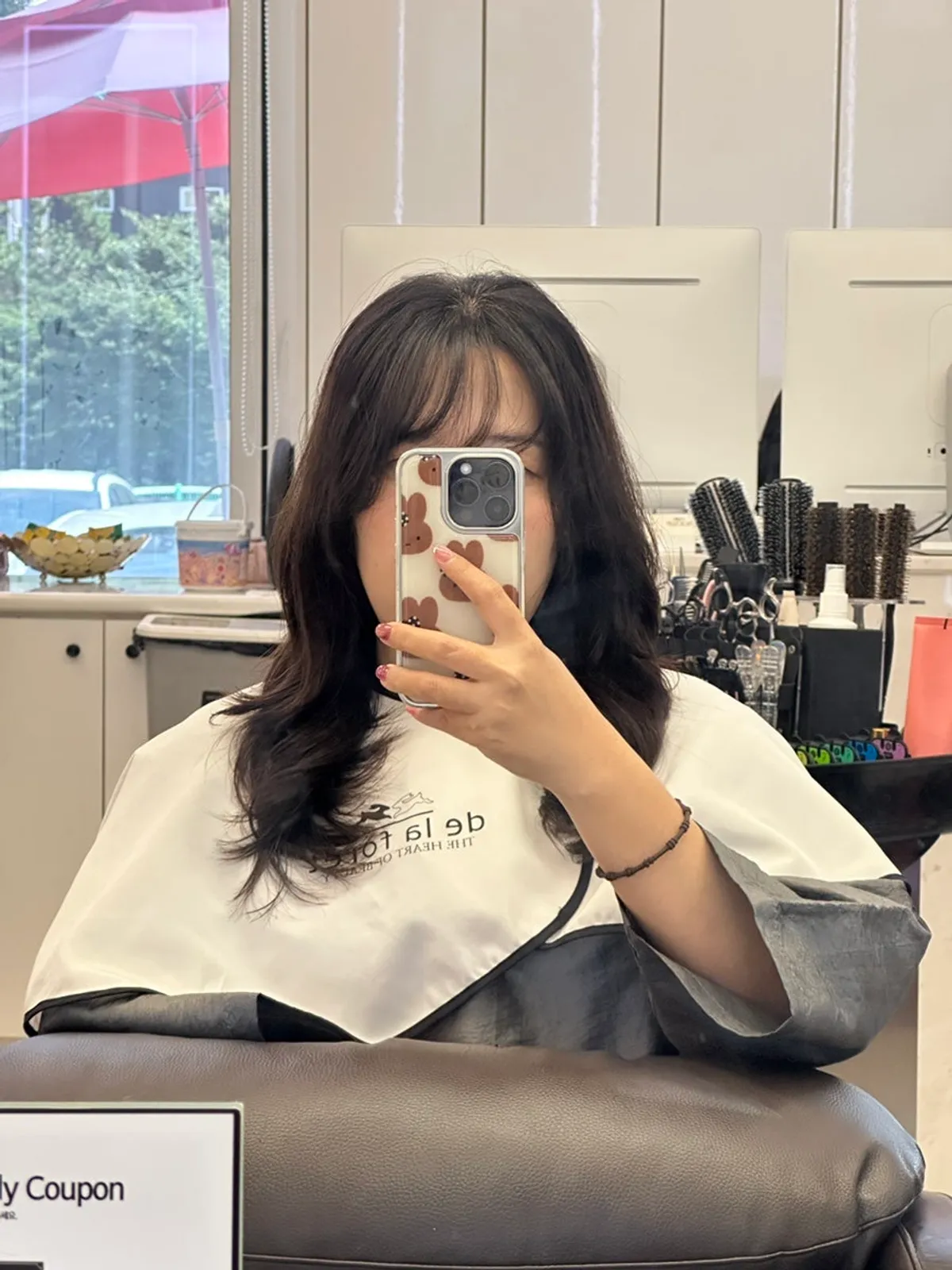 Natural-looking bangs and build perm styled by the designer
