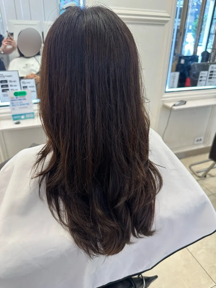 After shot of bouncy curls at the ends of the hair