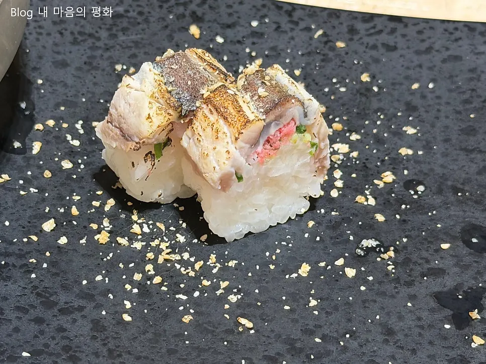Torch-seared mackerel sushi