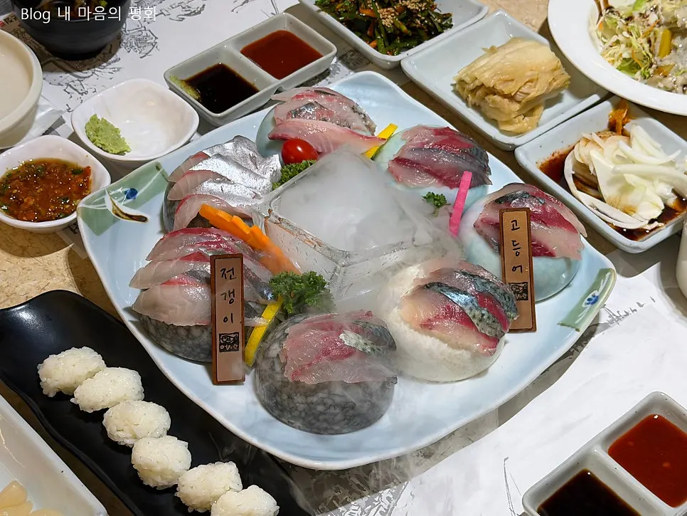 Mackerel and horse mackerel sashimi plating with rising dry ice smoke