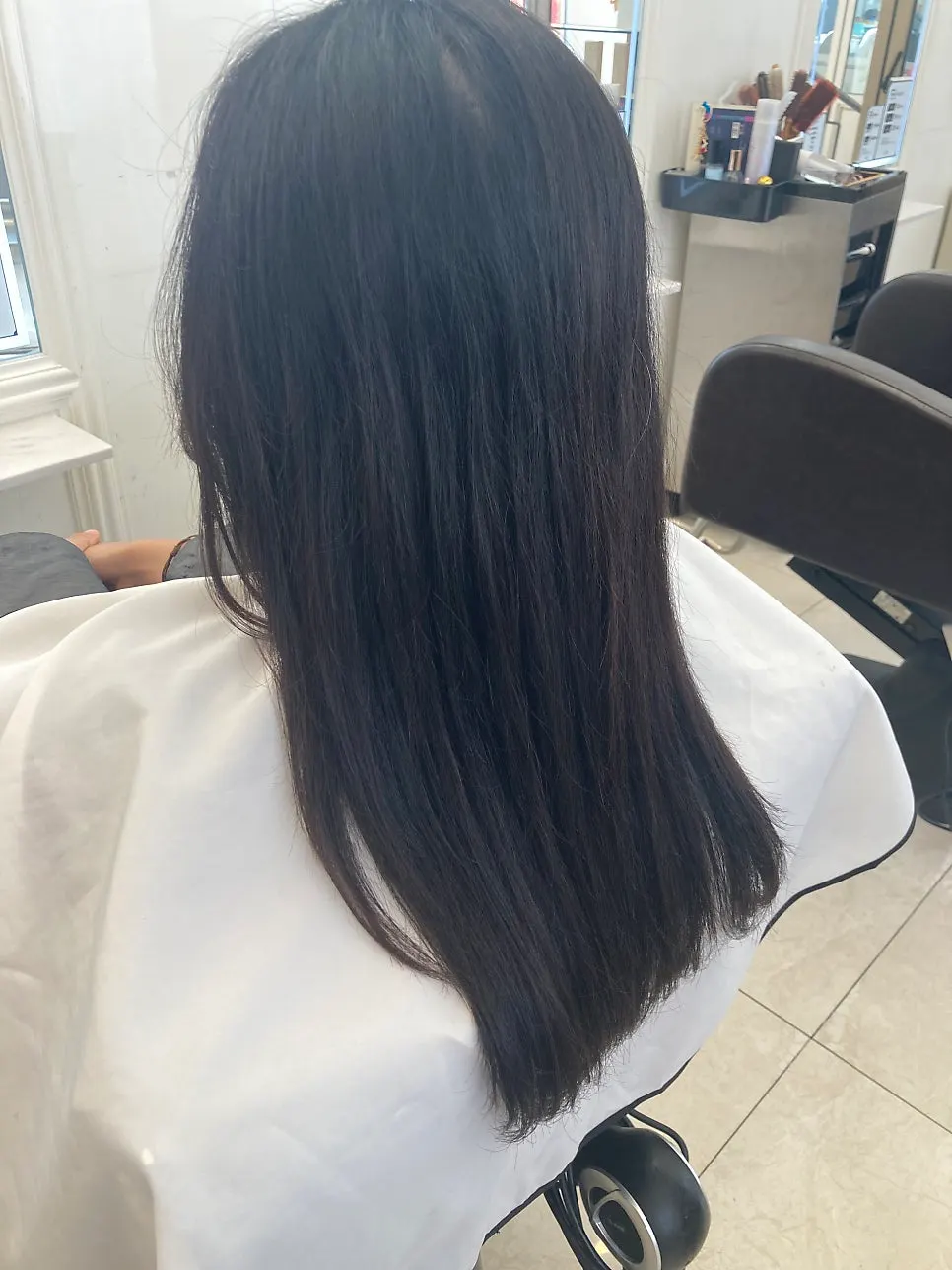 Long hair looking silky and bouncy after the clinic