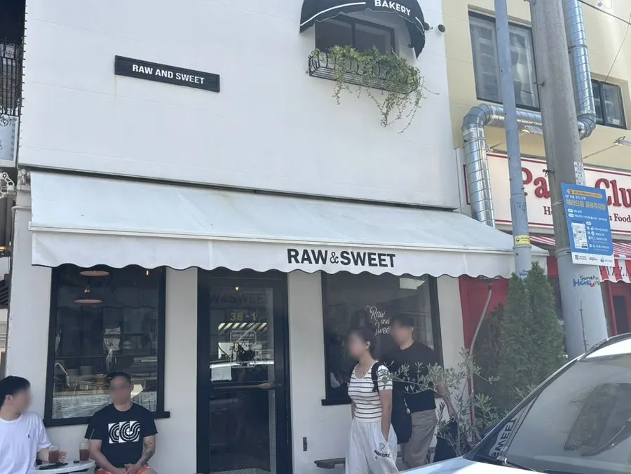 Entrance of Low & Sweet Bakery viewed from the alley
