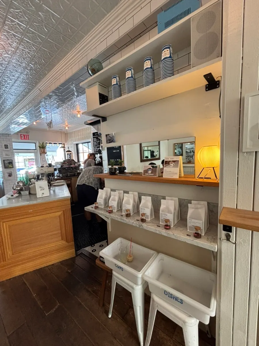 Lively interior of Low & Sweet Bakery full of customers