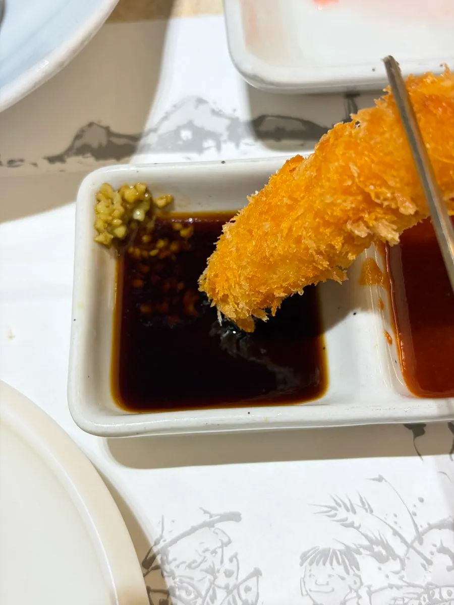Fried shrimp heads and fried shrimp served for dessert