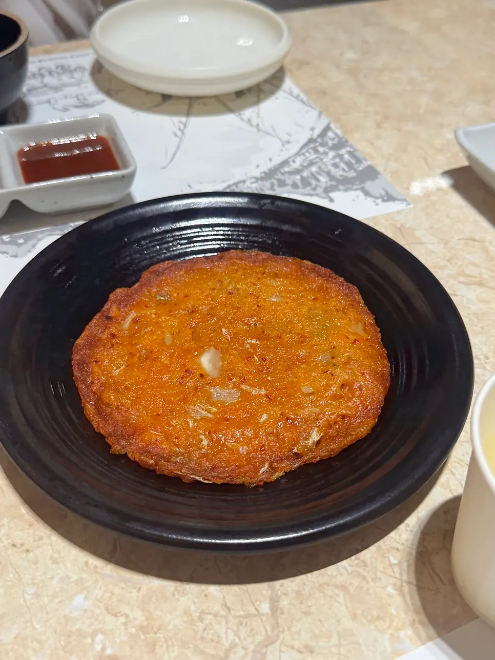 Shrimp sushi served with fried shrimp heads