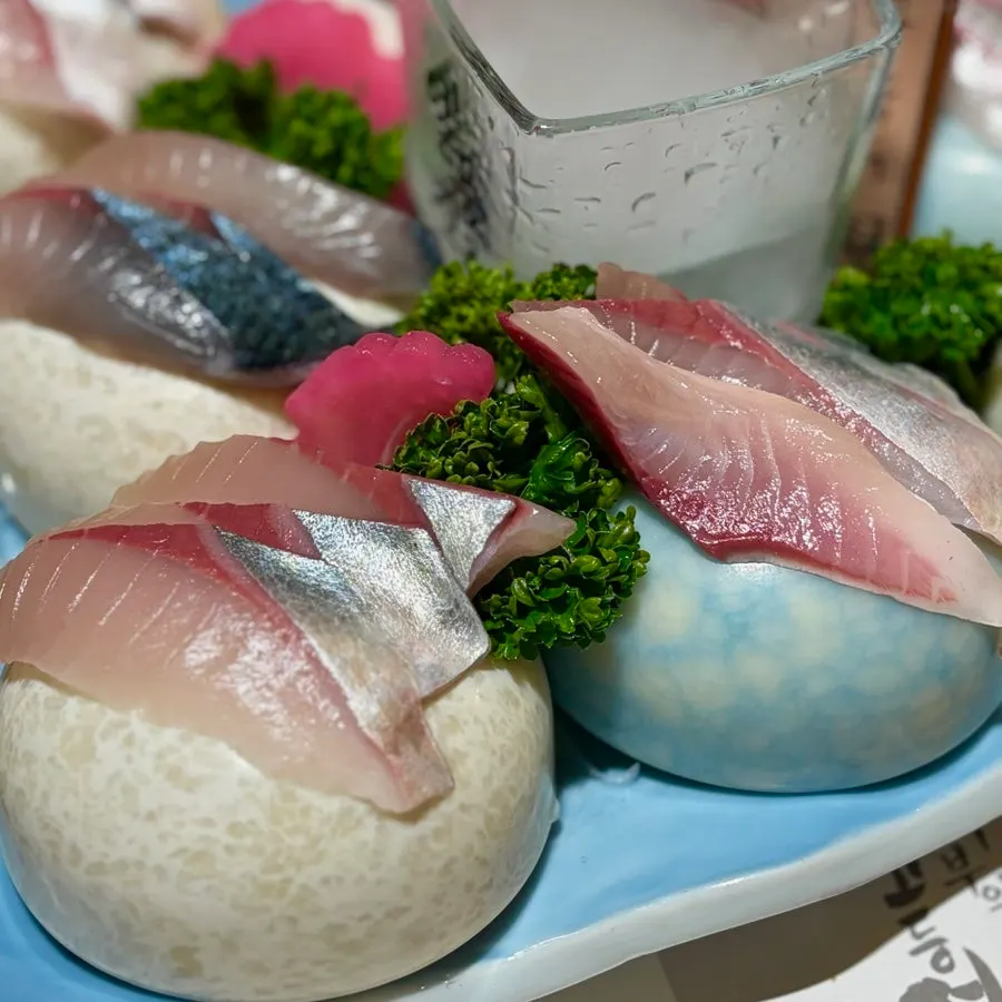 Close-up of thickly sliced mackerel sashimi
