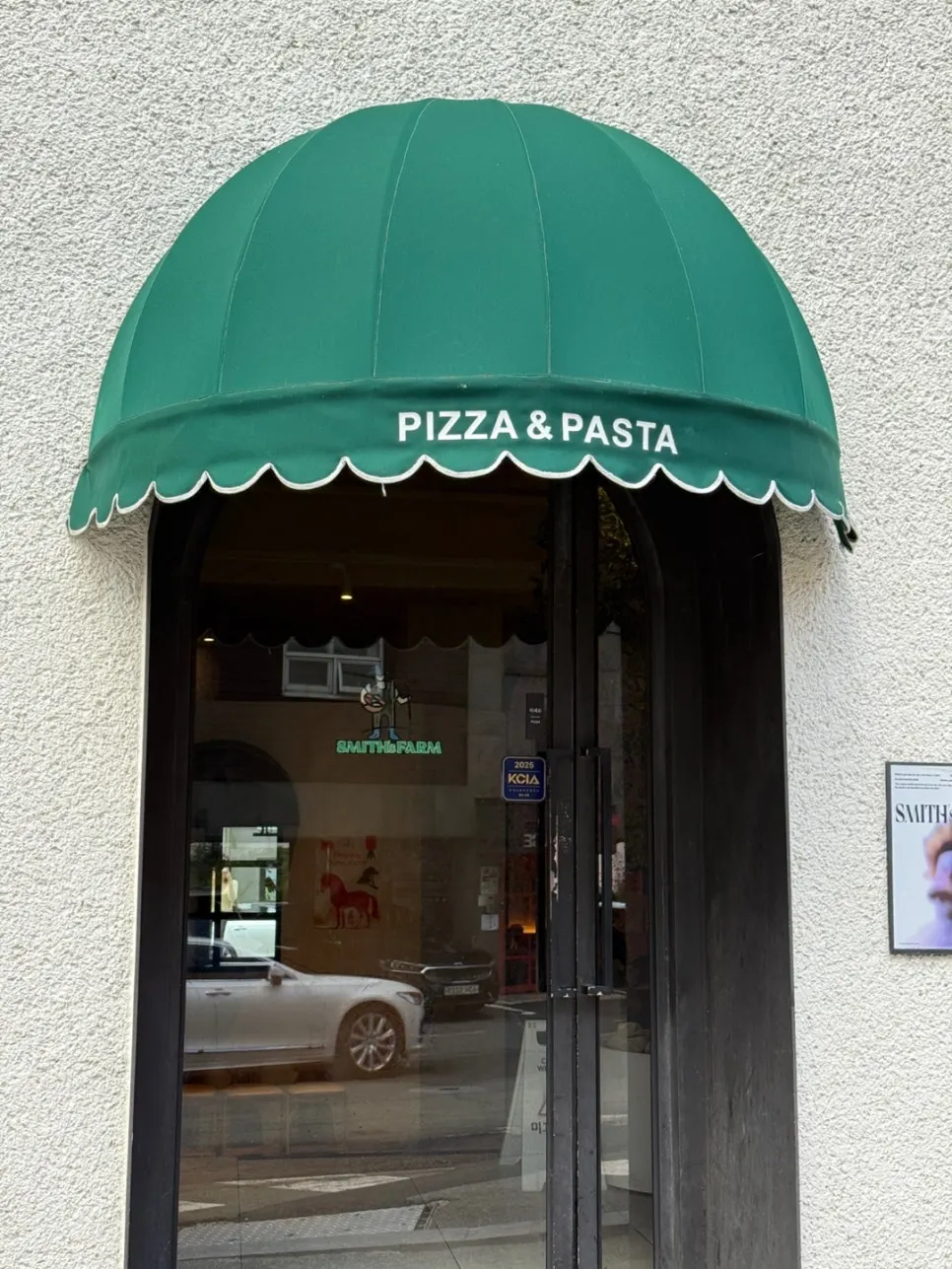 Restaurant entrance marked PIZZA & PASTA