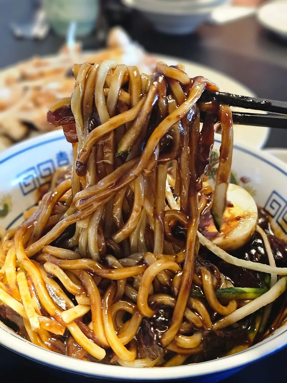 Noodles coated in savory jajang sauce