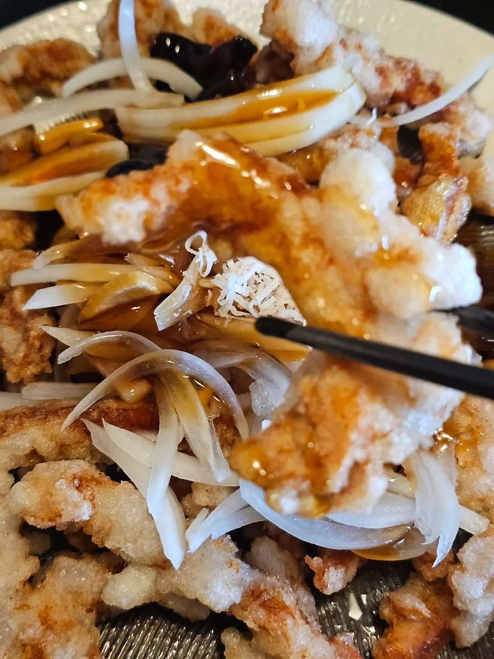Plate of pork loin tangsuyuk with black vinegar sauce
