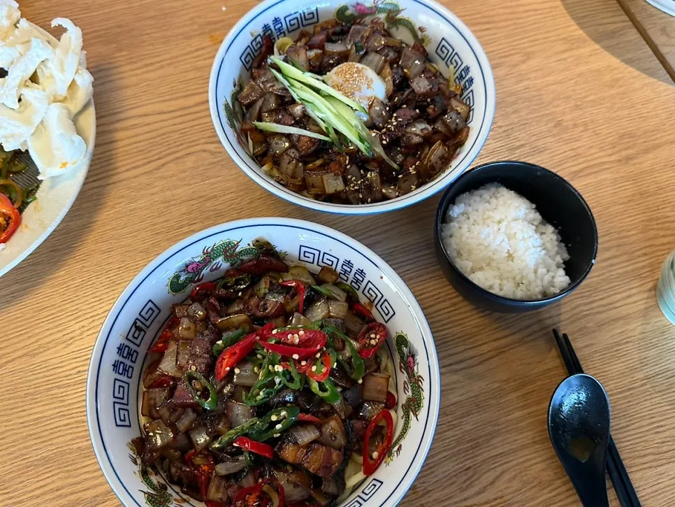 Poached-egg ganjajang and spicy ganjajang served together