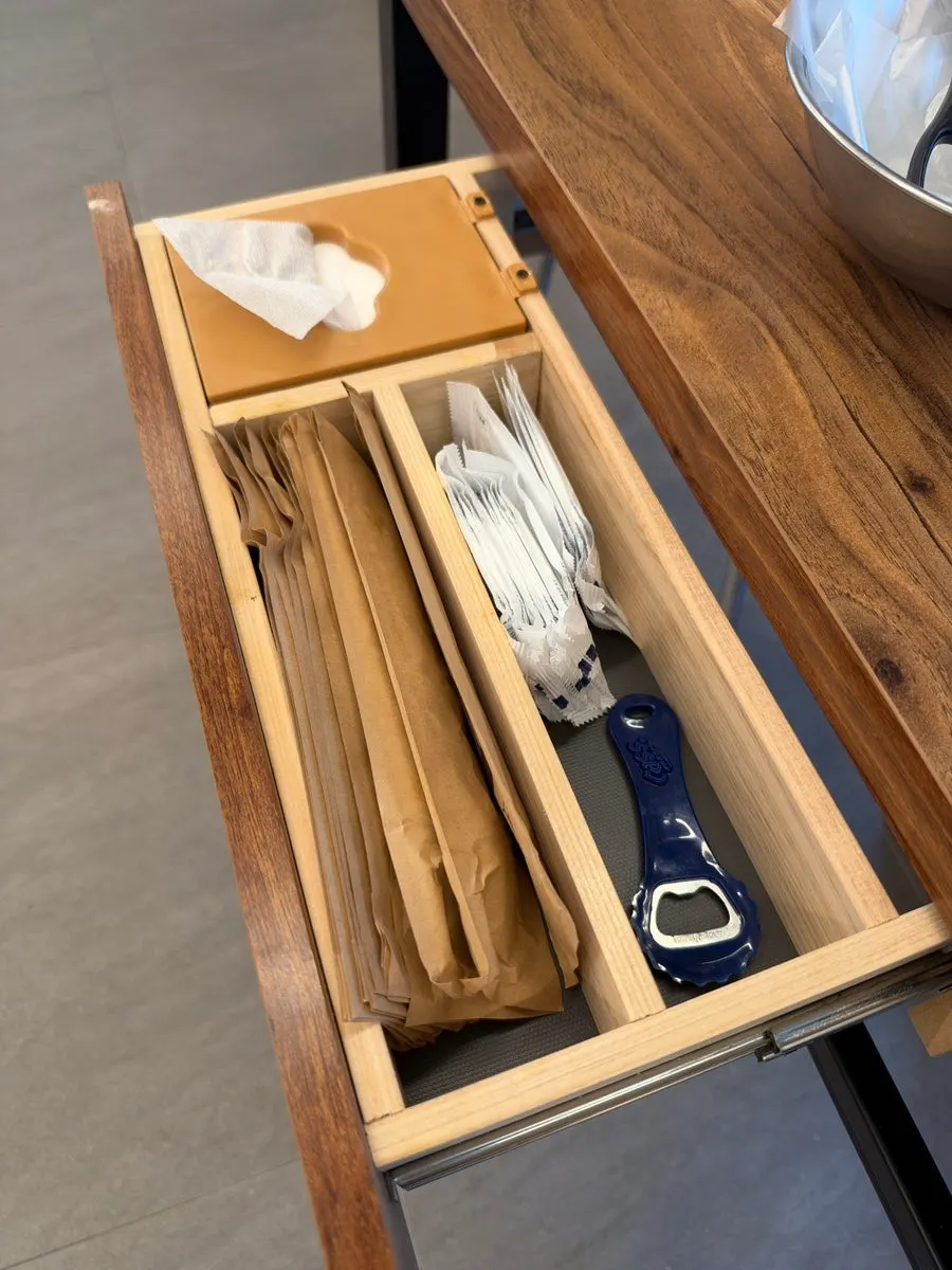 Spoons and chopsticks served wrapped in paper at Deodo Gejang