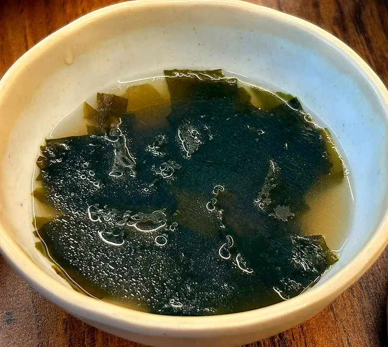 Seaweed soup served with the meal