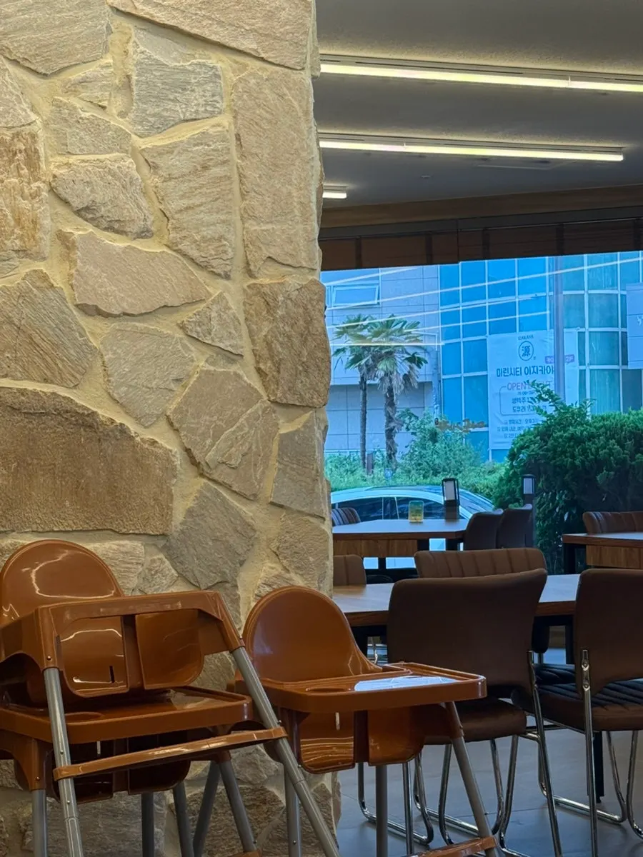 Baby chairs set up in a corner of the restaurant
