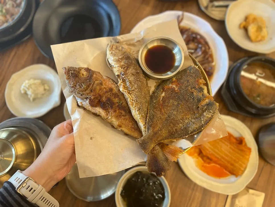 Three types of grilled fish, nicely browned