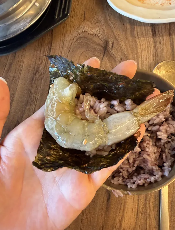 A piece of soy yellow crab placed on pot rice