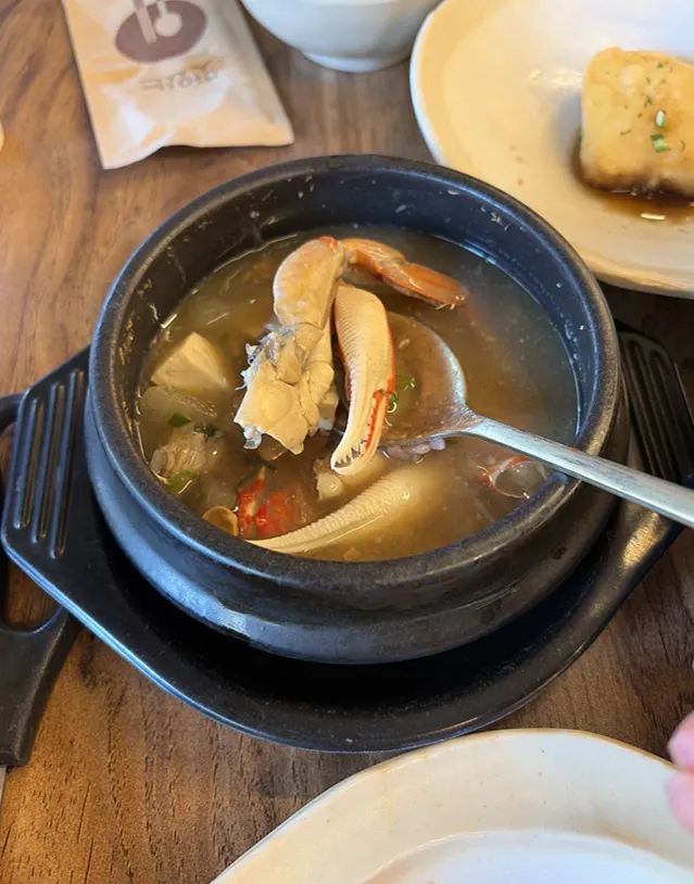 Soy-marinated shrimp served with rice on seaweed