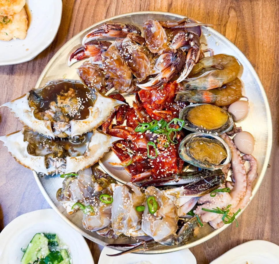Modeum-jang with soy crab, spicy crab, marinated shrimp, abalone, and octopus