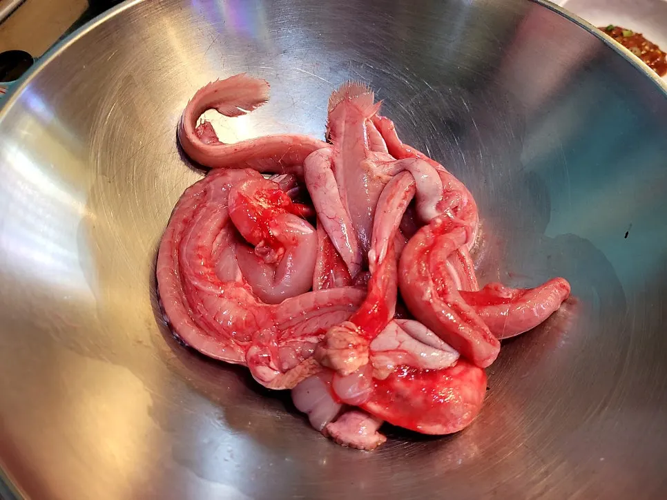 Prepped hagfish tossed with seasoning and vegetables