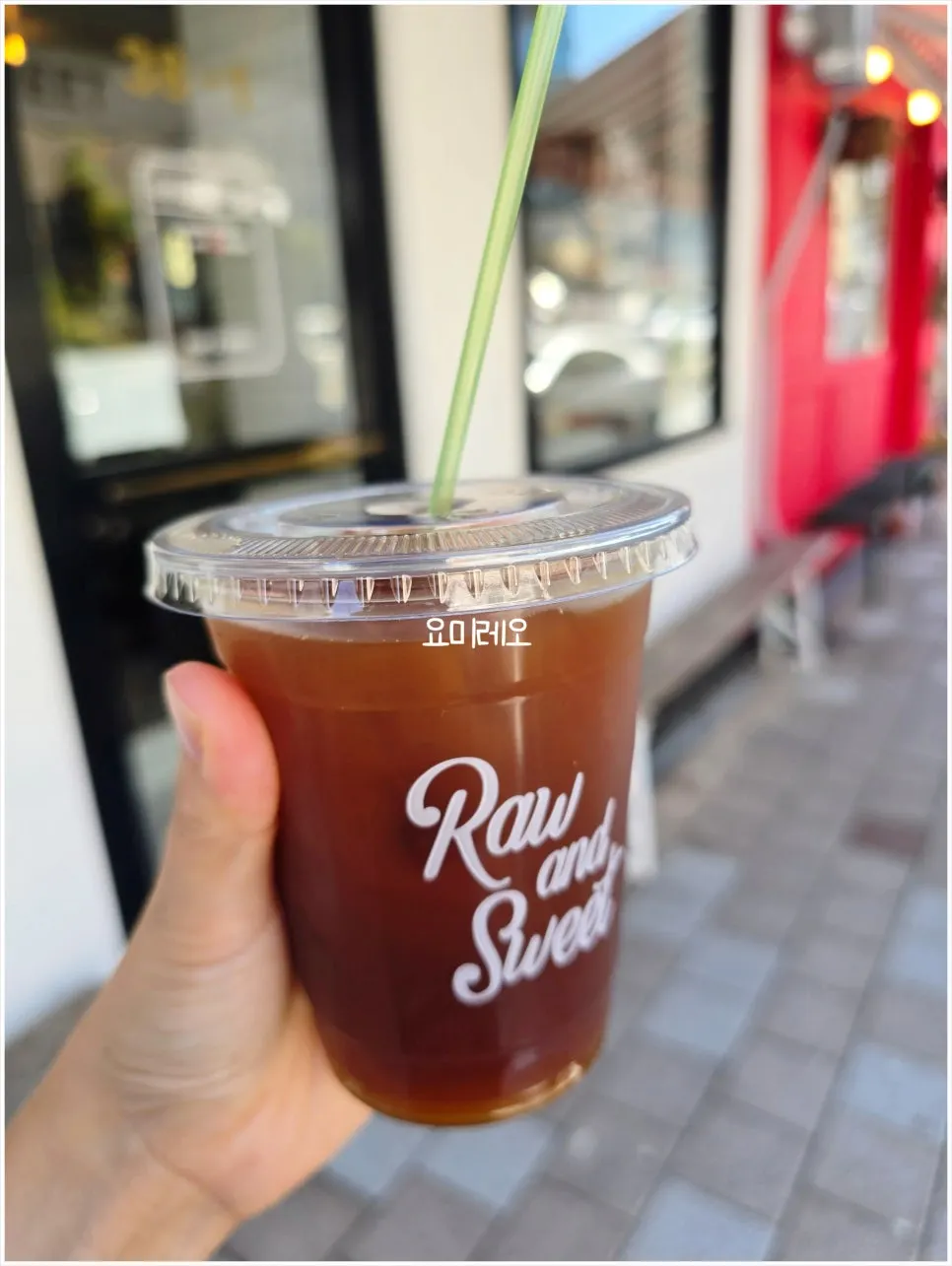 Iced americano in a takeout cup
