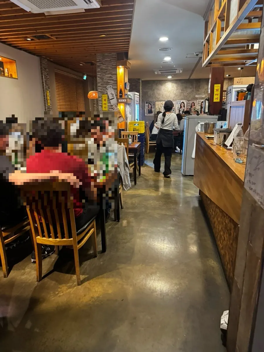 Interior seating and 2nd-floor space at Namcheonjip, Haeundae