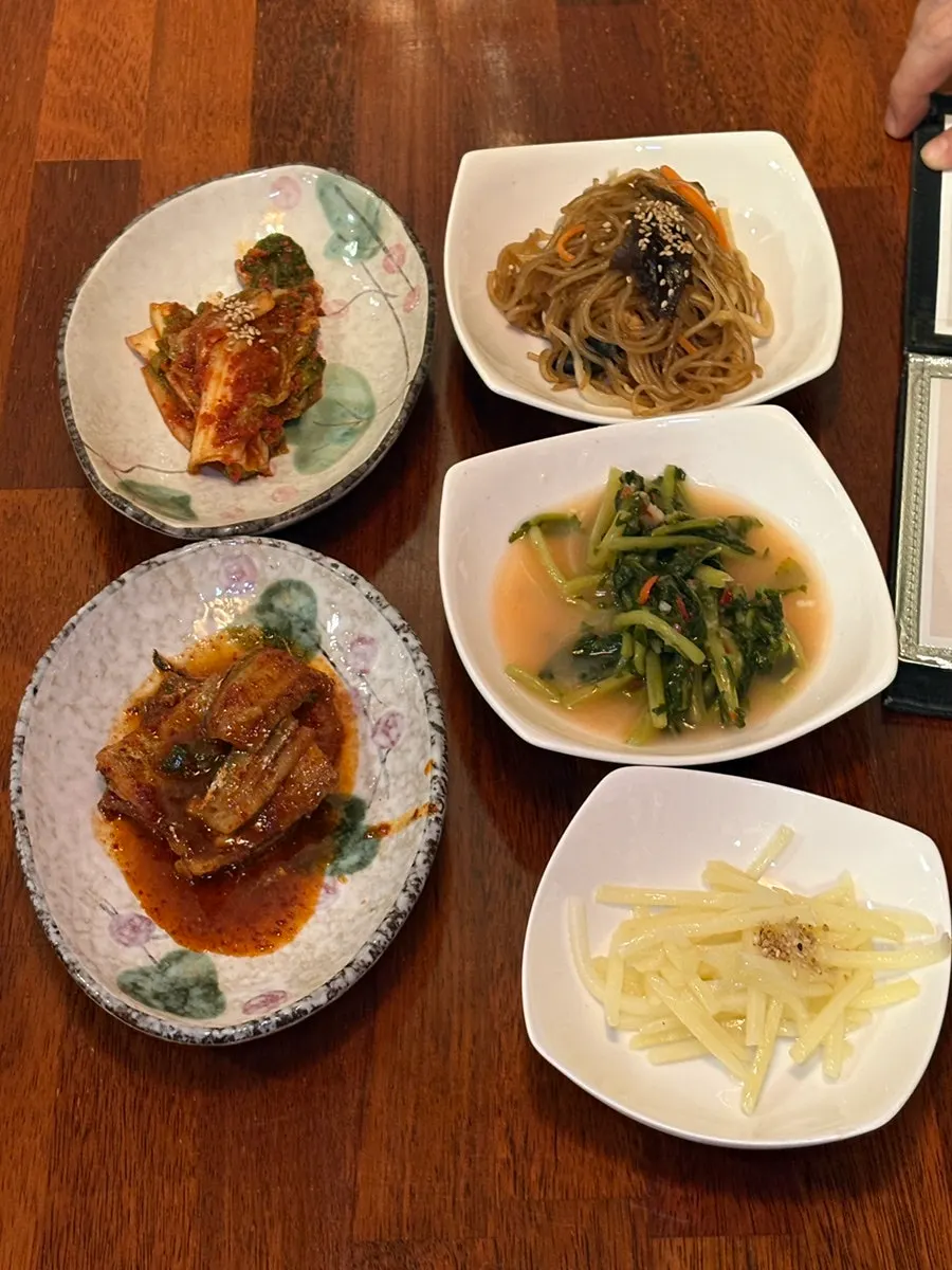 A full spread of Namcheonjip's banchan