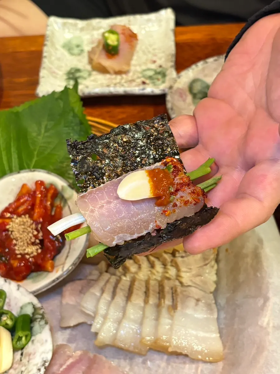 Hongeo samhap wrapped in lettuce
